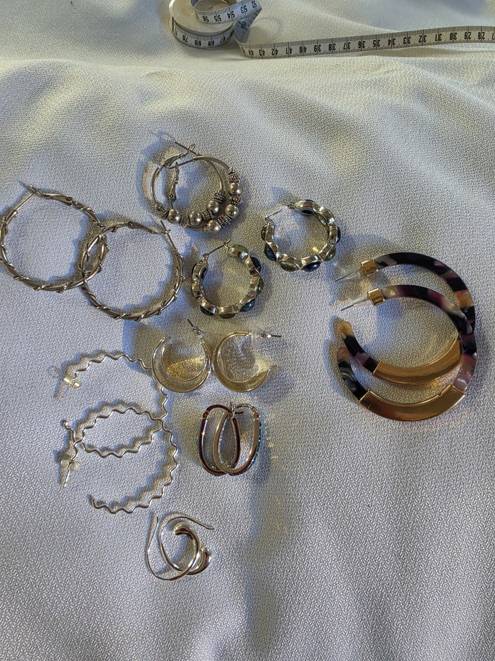 8 Pair Of Hoop Earrings